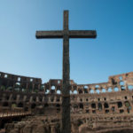 Finding Glory in Pain and Problems Part 1 of 2 - Weekly Blog Post by Dr. Craig Biehl - cross in Roman coliseum