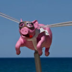 Art, Space Junk, and Ultimate Beauty - Weekly Blog Post by Dr. Craig Biehl - flying pink pig statue