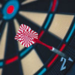 Missing the Mark - Weekly Blog Post by Dr. Craig Biehl - colorful dart board with dart at edge