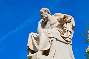 Is Philosophy Bad? - marble statue of man thinking against blue sky