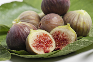 Gleanings from The Religious Affections (Part 30): Distinguishing Sign Twelve: Gracious Affections Produce Christian Works (4) - Weekly Blog Post by Dr. Craig Biehl - bunch of ripe figs on foliage