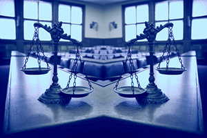 The Human Limitations of Unreasonable Atheism (Part 20): “Doctrinal Disproofs” (Part D) - Weekly Blog Post by Dr. Craig Biehl - two scales of justice in empty courtroom