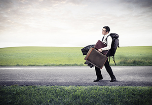 Baggage, Responsibility, and the Display of God’s Excellence - Weekly Blog Post by Dr. Craig Biehl - man weighted down by baggage